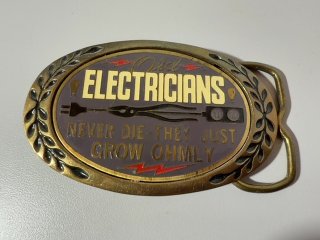 Item #505 — Old Electricians Belt Buckle 3.5 x 2.5 photo 1 of 3