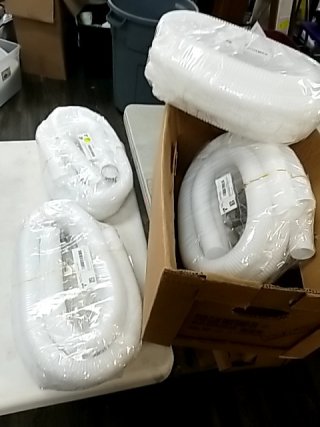 Item #466 — New White Flexible Drain Hoses photo 1 of 3