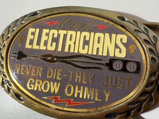Item #505 — Old Electricians Belt Buckle 3.5 x 2.5 photo 2 of 3