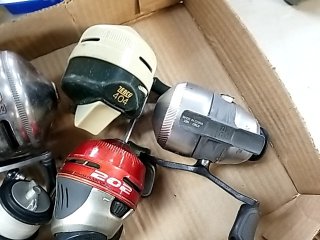 Item #106 — Fishing Reels Lot photo 3 of 4