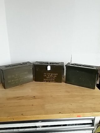 Item #406 — THREE Military Ammo Cans on Wood Table Each approx 10 by 7 by 4 inch photo 1 of 4