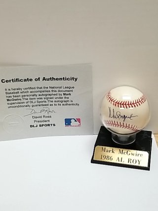 Item #1 — Mark McGwire Signed Baseball with COA