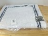 Item #593 — New White Bath Rug with Blue Trim