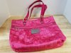 Item #208 — Pink Coach Handbag