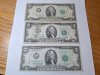 Item #90 — Three $2 bills, one is torn in half