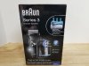 Item #10 — Braun series 3 shaver, appears to have never been used
