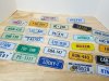 Item #81 — Assorted Vanity License Plates, 6 in ea.