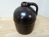 Item #23 — Antique Stoneware Jug, chip on base, 9 in