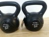 Item #450 — New Pair of 5lb Kettlebells