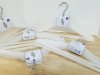 Item #277 — New White Plastic Hangers