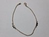 Item #677 — Heart themed 7 inch bracelet,  gold toned
